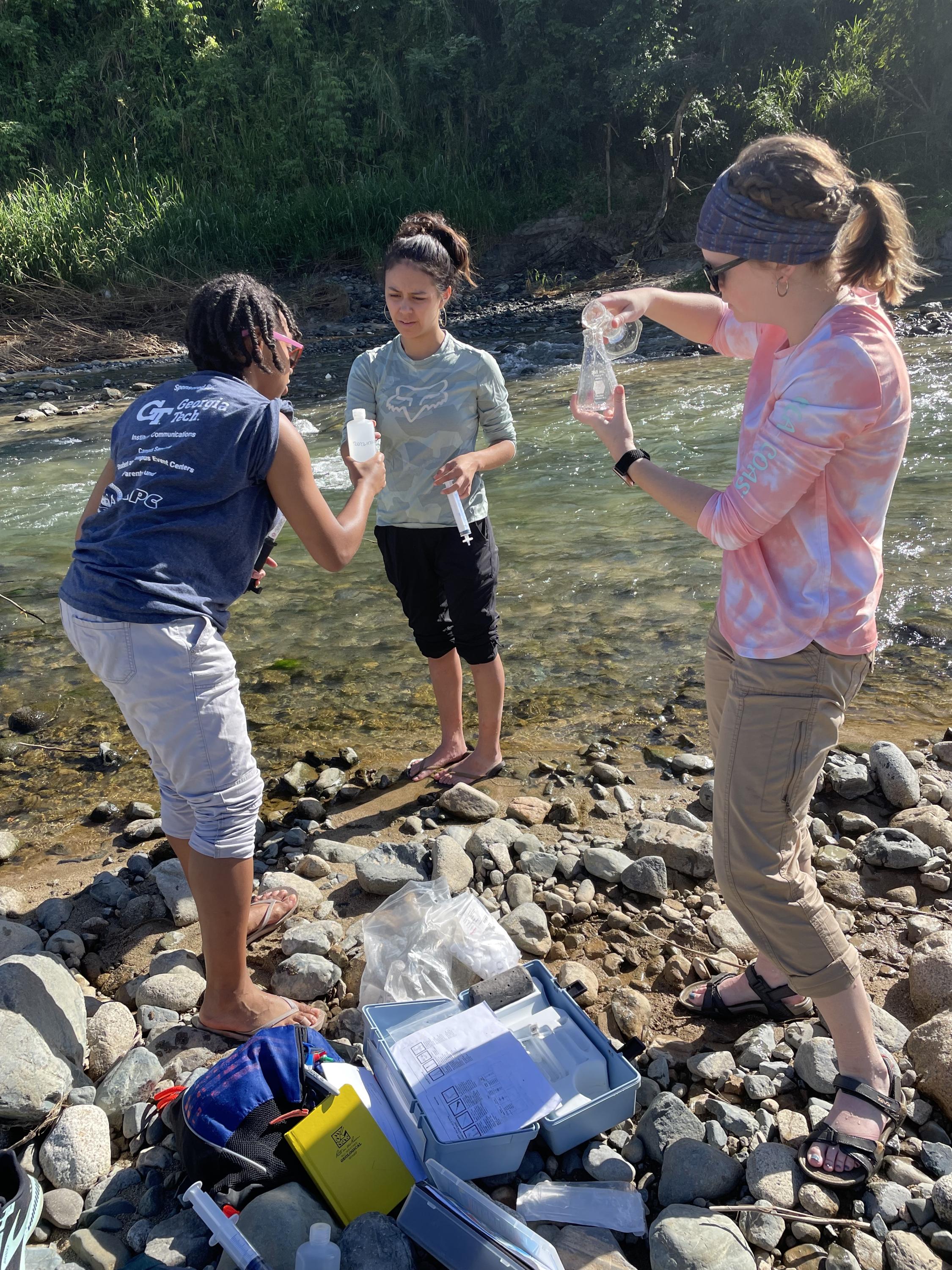 EAS graduate students sample water during a November trip to Puerto Rico